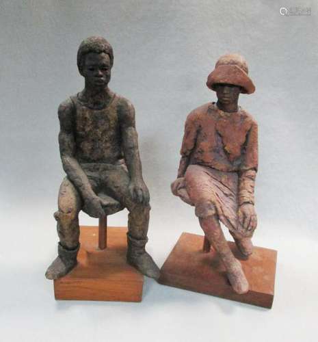 J D Palmer, a stoneware figure of a seated woman on