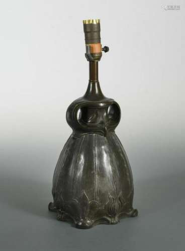 An Art Nouveau bronzed metal table lamp,