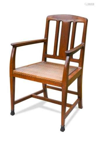 An early 20th century walnut elbow chair, possibly