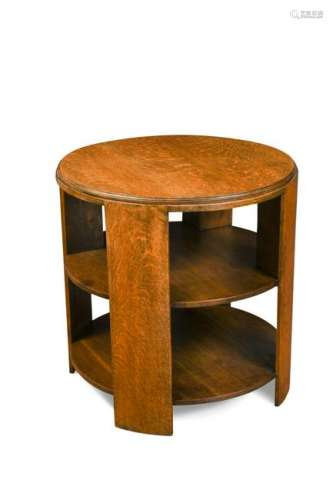 An Art Deco oak book table in the manner of Heals,