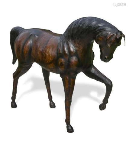 A large leather clad model of a horse,