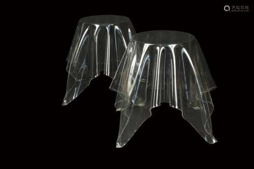 A pair of contemporary clear acrylic illusion tables,