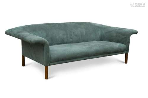 A large modern blue/green suede effect three-seat sofa,