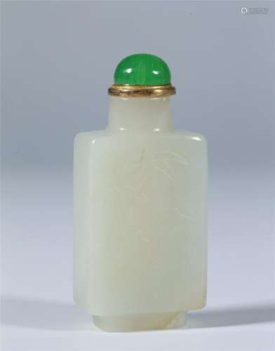 A CHINESE WHITE JADE SNUFF BOTTLE,CARVED IN LOW RELIEF
