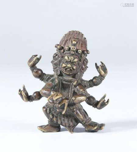 A CHINESE GILT-LACQUERED BRONZE FIGURE OF A GUARDIAN