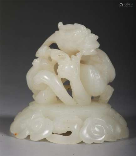 A CHINESE FINELY CARVED WHITE JADE DRAGON FINIAL