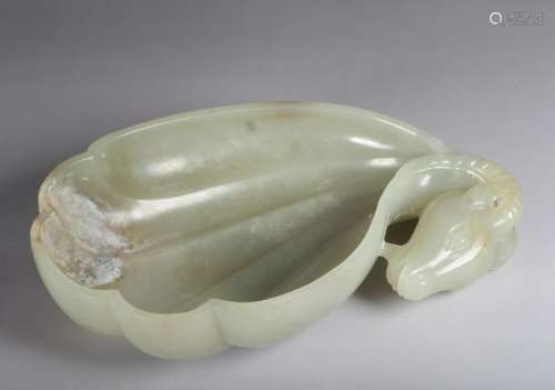A CHINESE PALE CELADON JADE 'RAM-HEAD' WASHER