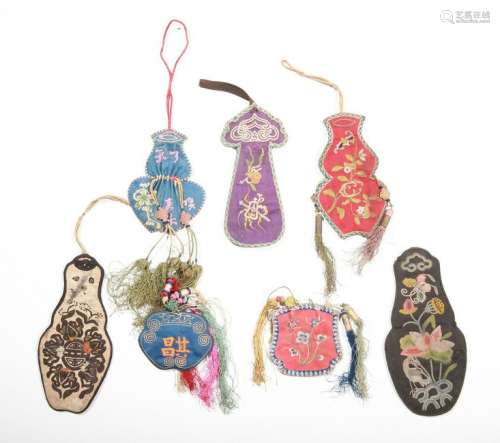 A SET OF CHINESE EMBROIDERED SILK POUCHES