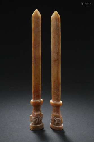 A Group of Two Jade Sword