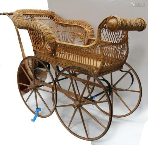 A Weaved Cane Baby Stroller