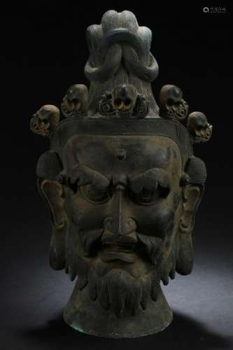 A Chinese Bronze Deity Head Statue
