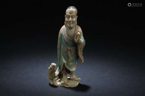 A Chinese Porcelain Statue