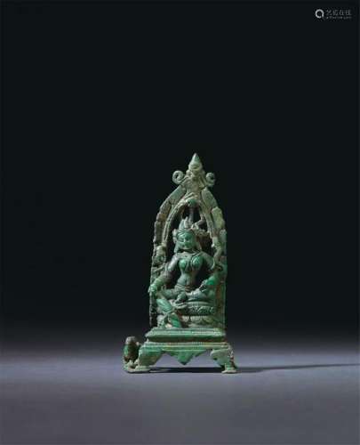 A BRONZE FIGURE OF GREEN TARA