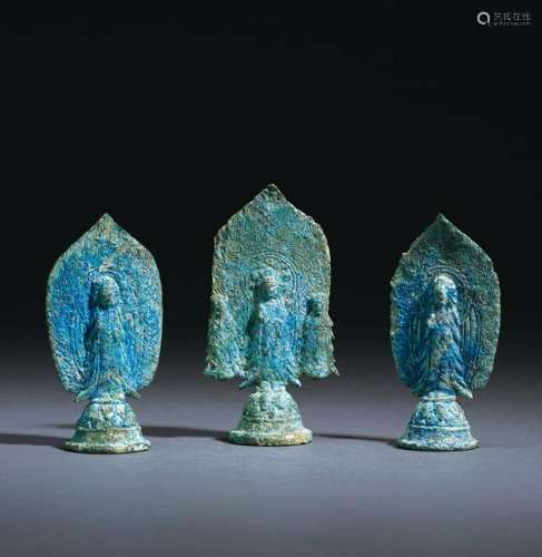 A GROUP OF THREE BRONZE FIGURES OF BUDDHA