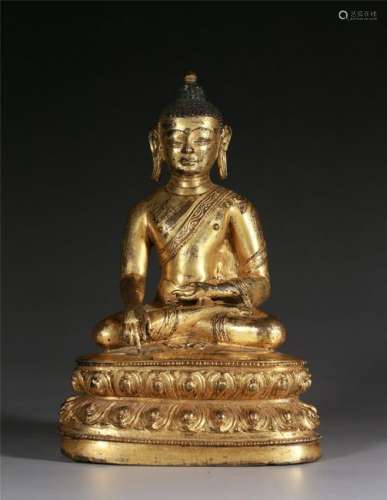 A GILT COPPER-ALLOY FIGURE OF BUDDHA SHAKYAMUN