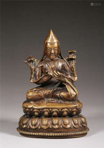 A GILT-BRONZE FIGURE OF TSONGKHAPA