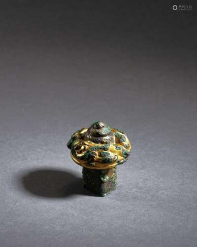 A WELL-CAST CHINESE GILT COPPER-ALLOY MUSIC TURNER