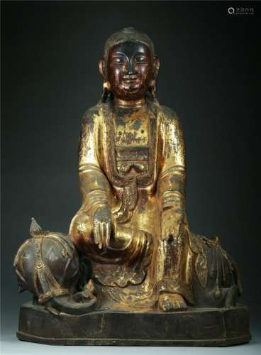 A CHINESE LACQUER-GILT BRONZE FIGURE OF GUANYIN