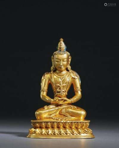 A CHINESE GILT-BRONZE FIGURE OF AMITAYUS