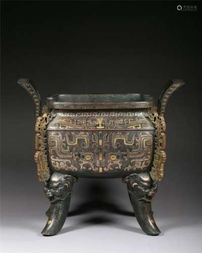 A SILVER AND GOLD-INLAID BRONZE INCENSE BURNER