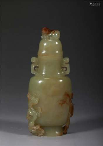 A YELLOW AND RUSSET JADE 'CHILONG' VASE AND COVER