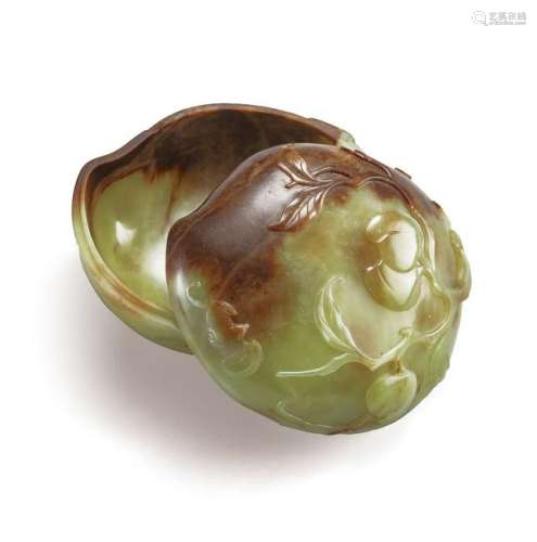 A YELLOW AND RUSSET JADE PEACH-SHAPED BOX AND COVER