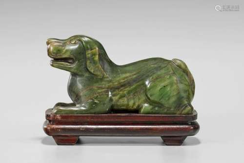 CARVED SPINACH JADE MODEL OF A DOG