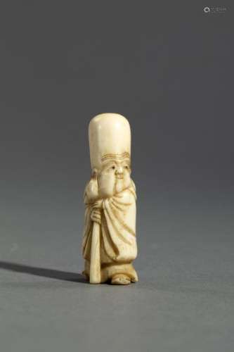 NETSUKE en ivoire représentant le dieu du bonheur …