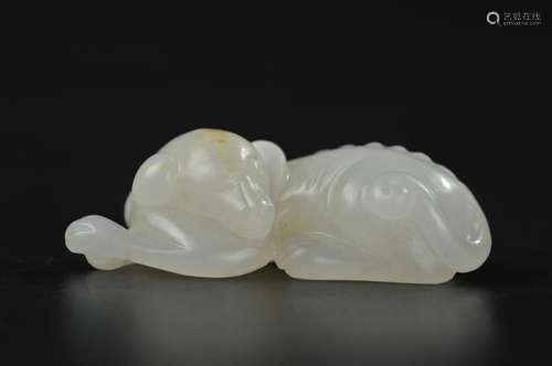 CHINESE WHITE JADE CARVED DOG, QING DYNASTY