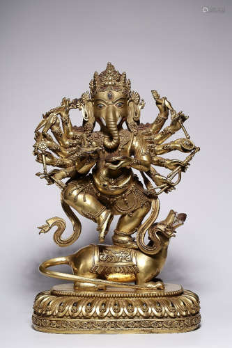 GILT BRONZE 12-ARM ELEPHANT-HEADED HINDU GOD