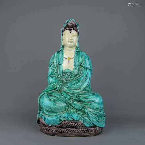 A Chinese San-Cai Glazed Porcelain Figure of Buddha