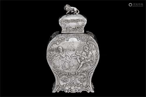 A German Carved Silver Tea Can with Cover