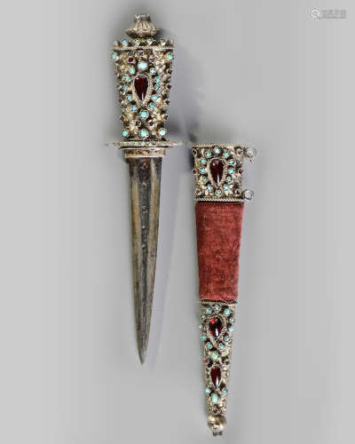 An Ottoman dagger with silver precious stone inlaid hilt