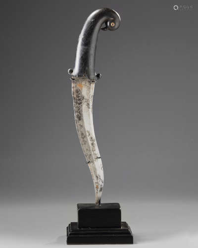 A Mughal dagger with pigeon-shaped hilt