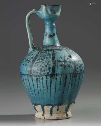 An Islamic pottery ewer