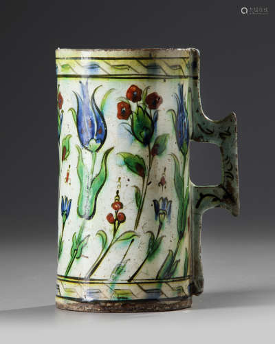 An Ottoman Iznik pottery tankard