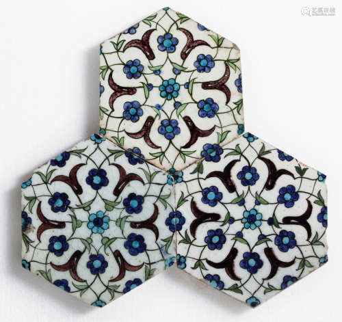 Three Ottoman hexagonal Iznik tiles