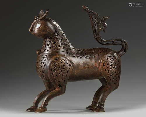 An Islamic Persian bronze incense burner