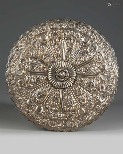 An Ottoman circular shaped silver mounted mirror