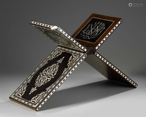 An Islamic wood mother-of-pearl, tortoise and ivory inlaid Quran-stand