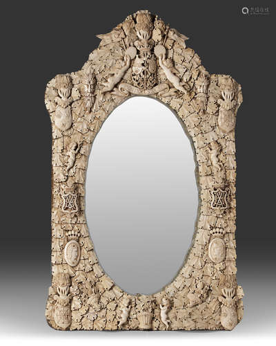 A large Deep carved ivory and bone wall mirror