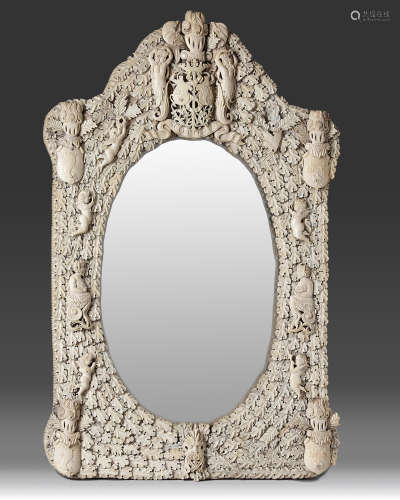 A large Deep carved ivory and bone wall mirror