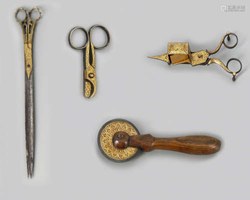 A group of four Ottoman gold-damascened calligrapher’s tools