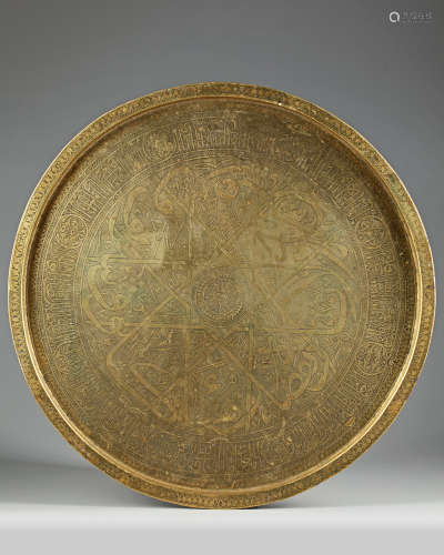 A Mamluk style brass circular tray