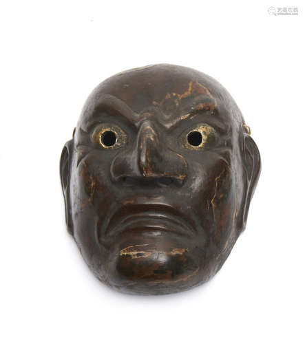 A large wooden Japanese bugaku mask