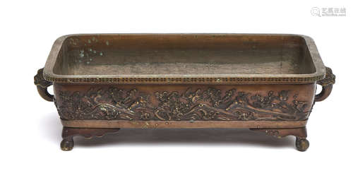 A Japanese rectangular bronze waterbasin (suiban) on four feet