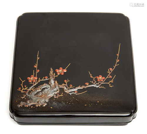 A Japanese square black lacquerwork box decorated with a blossom branch (kobai)