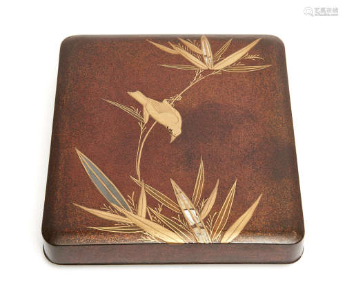 A Japanese lacquer writing box (suzuribako), decorated with a design of a bird in bamboo
