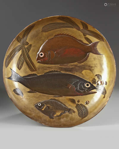 A large Japanese gilt and lacquer relief 'fish' charger