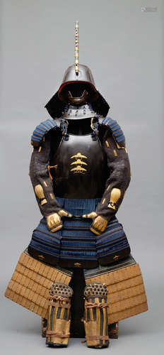 A Japanese black lacquered suit-of-armour (yoroi) with indigo-blue cords and a two part cuirass (kon’ito kuro’urushinuri hotokedō gusoku).